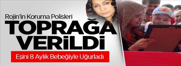 Rojin&#39;in Koruma Polisleri Toprağa Verildi